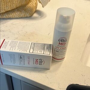 EltaMD UV Clear SPF 46 Skincare Cream with Red Accents
